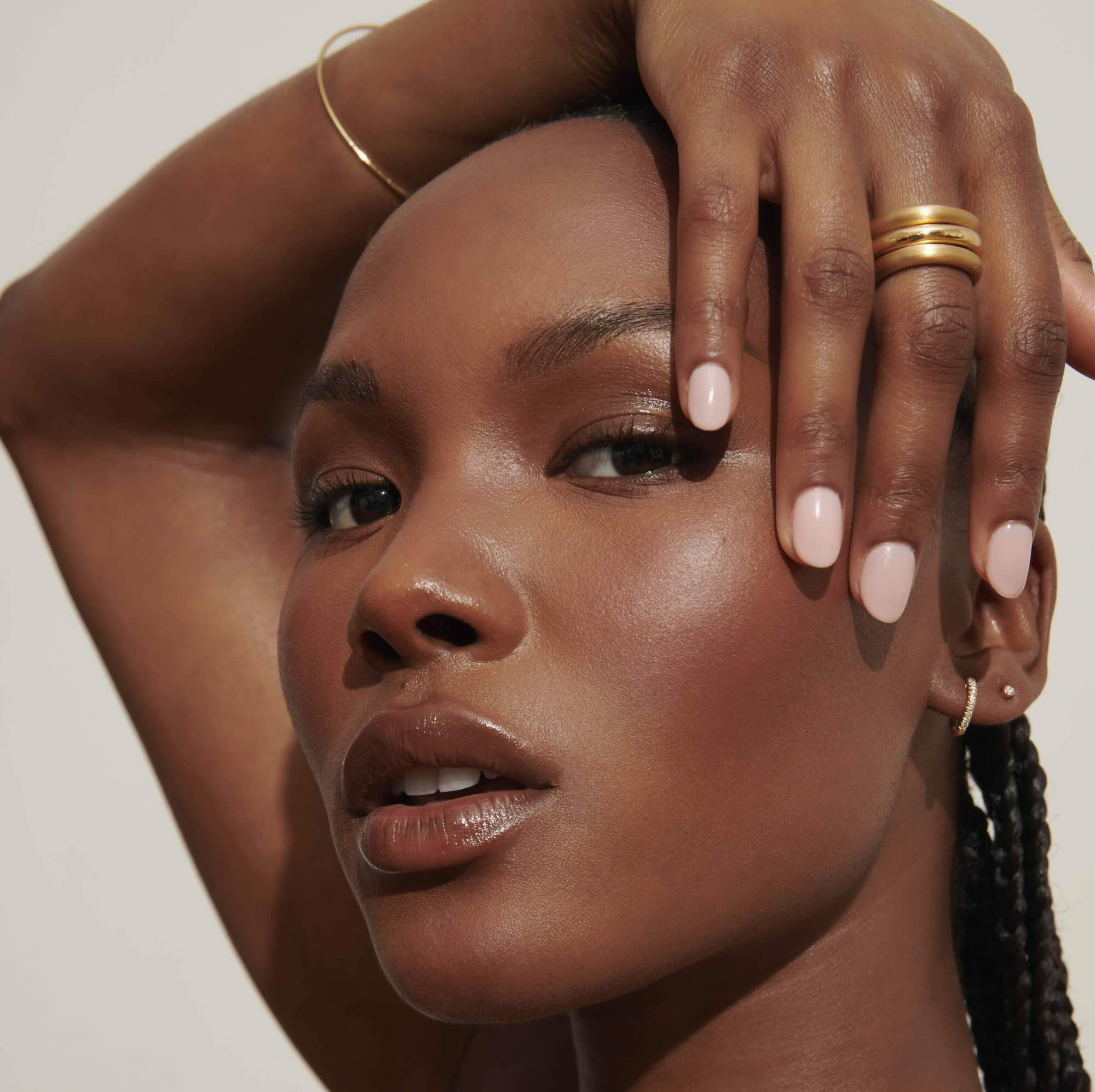 Model wearing stacked Barrel Rings from Vale Jewelry