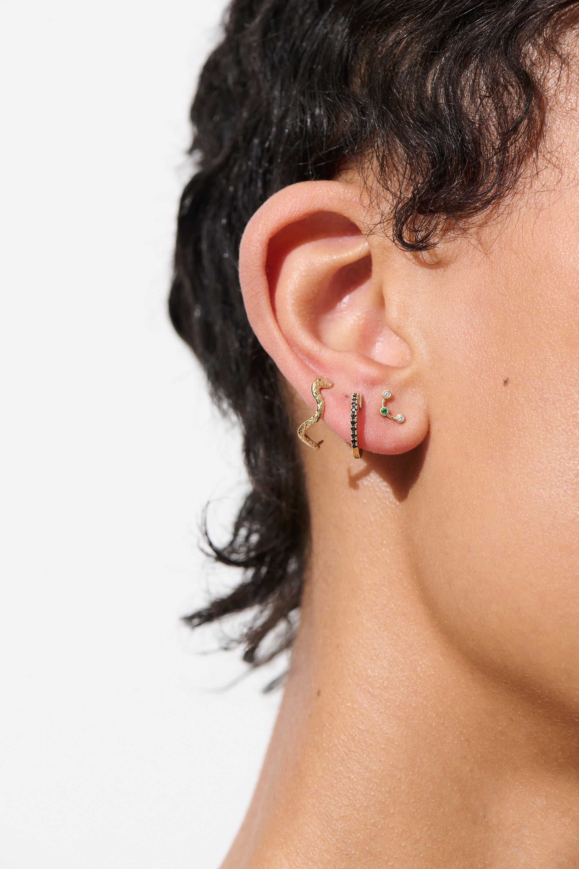 Vale Jewelry Eclipse Pave Huggies Earrings on Model with Black Side Only