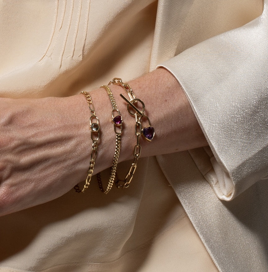 Vale Jewelry Heart Double Lock Curb Chain Bracelet on Hand Model 1