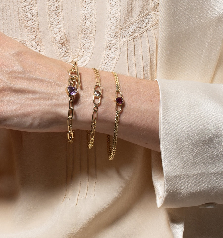 Vale Jewelry Heart Double Lock Curb Chain Bracelet on Hand Model