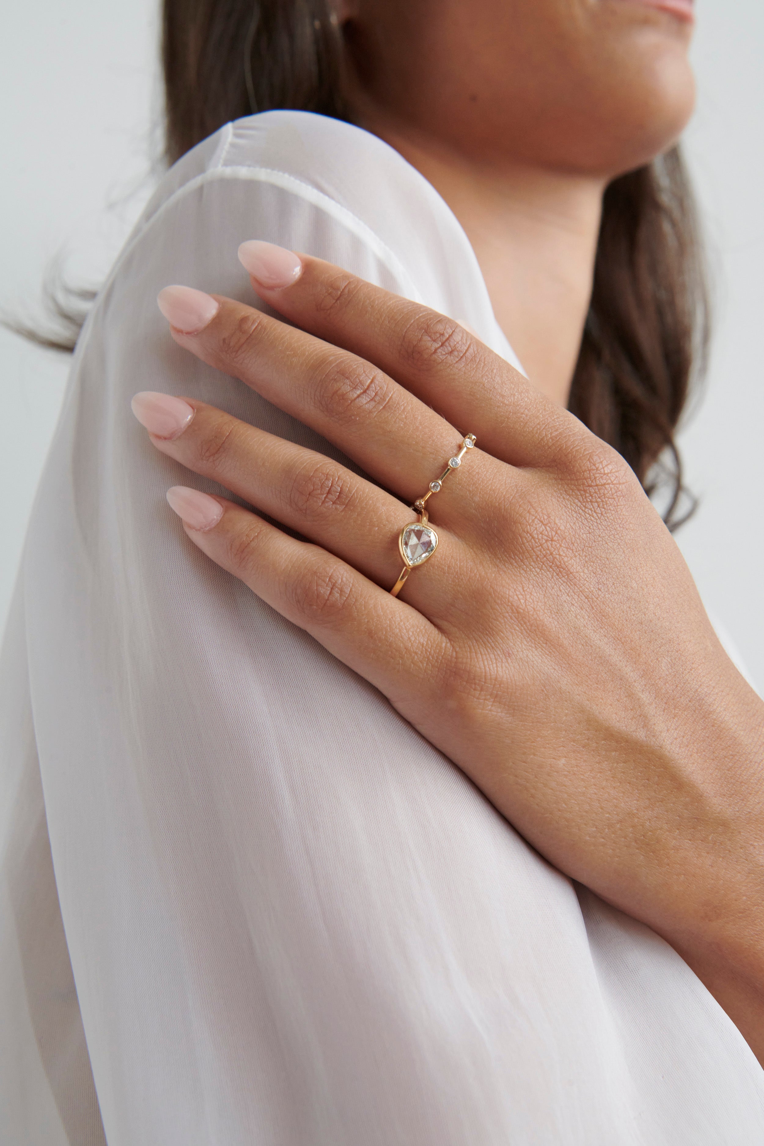 Close-up of Model Wearing Vale Jewelry Moonlet Ring with White Diamonds