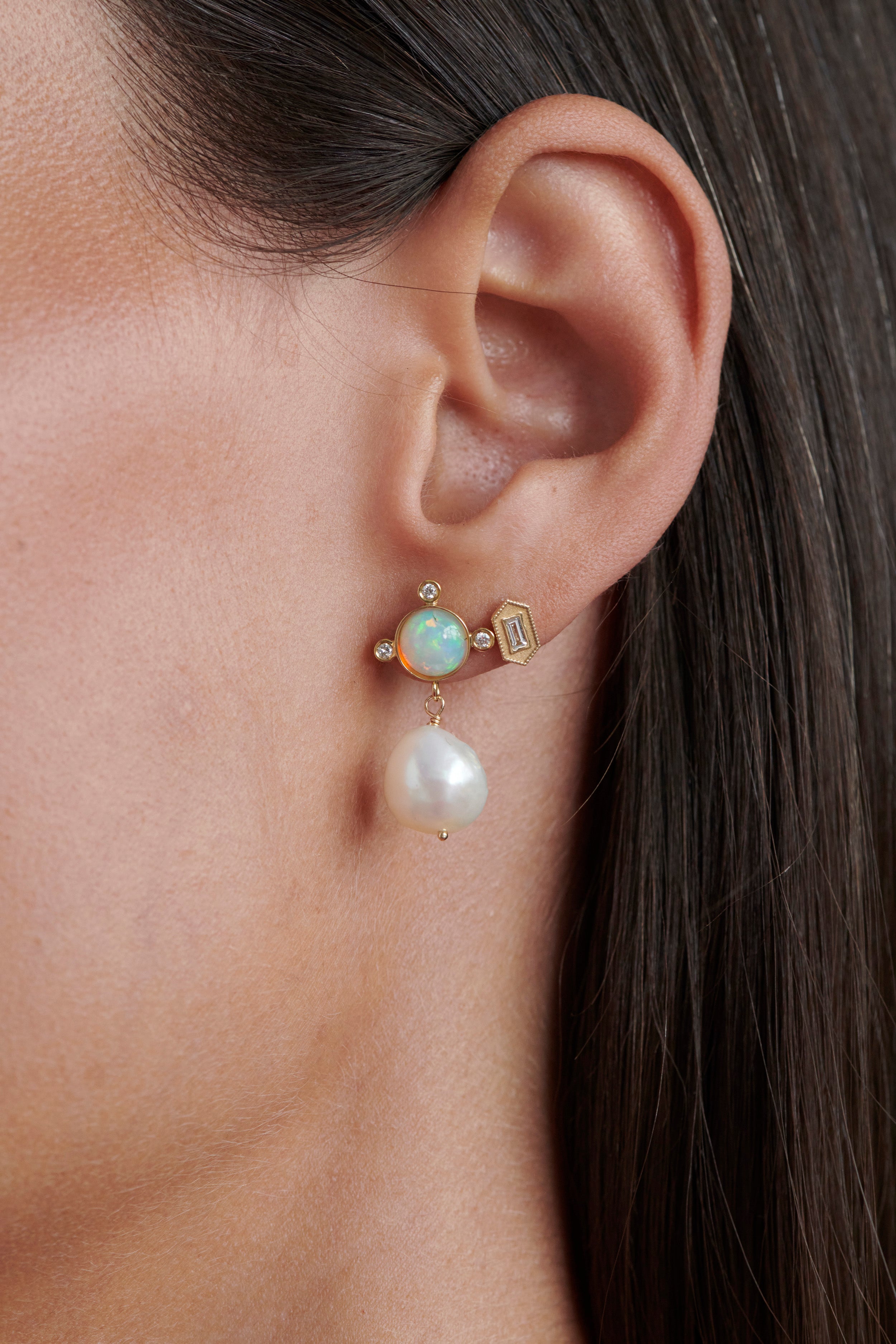 Close-up of Model Wearing Vale Jewelry Opal Cabochon Compass Diamond Earrings With Pearls and Verre Earrings