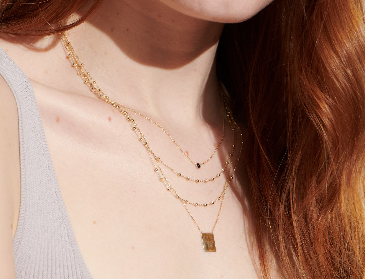Vale Jewelry Rectangle Plate Necklace on Model with Barely There Sapphire Necklace and Rosary Chain Necklace