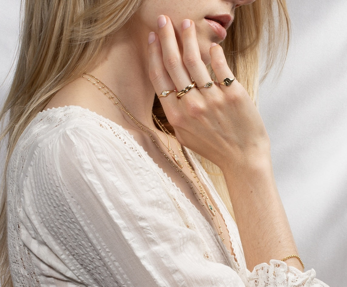 Vale Jewelry Skinny Signet Ring with Block Engraving on Model