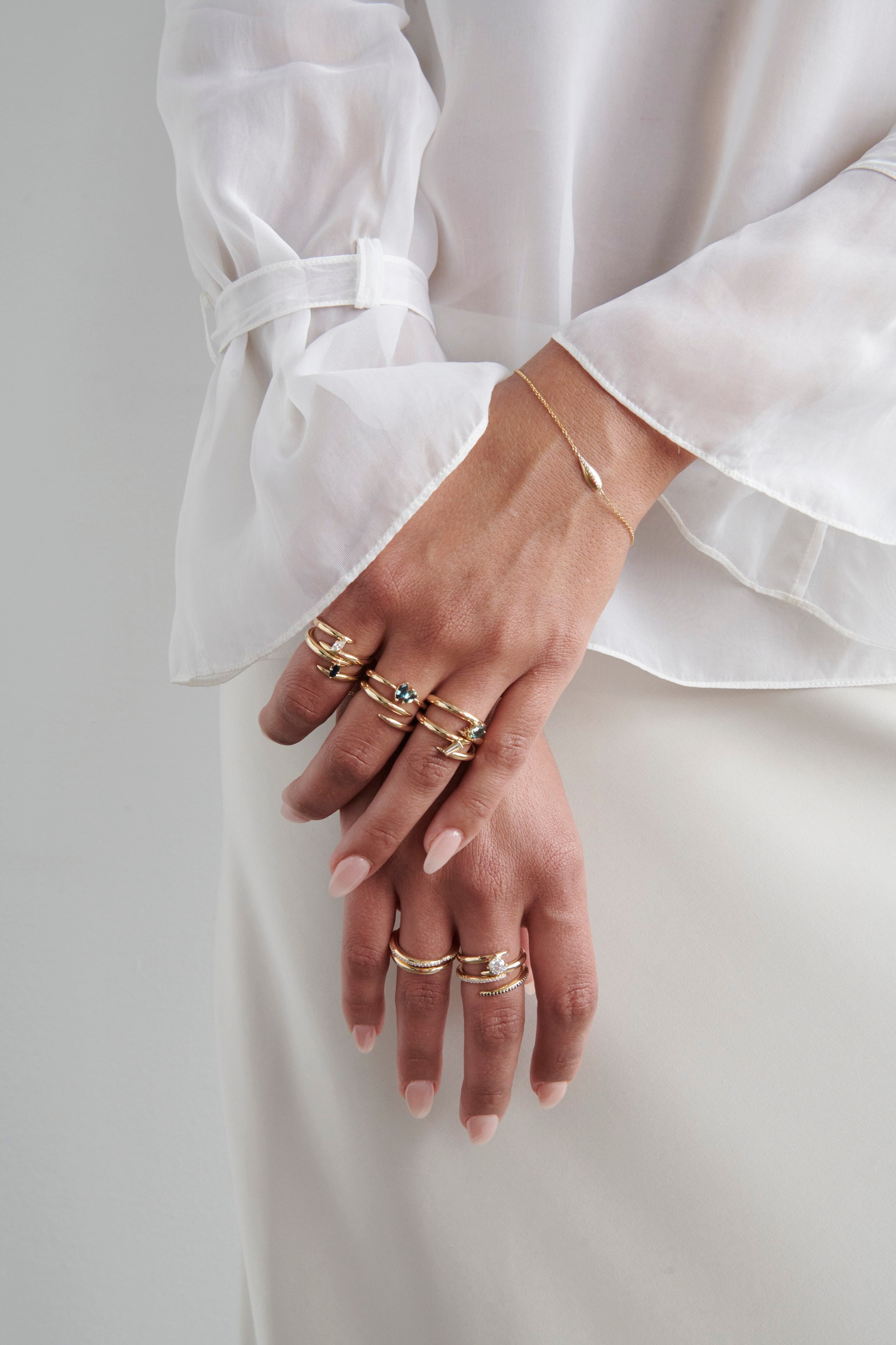 Close-up of Model Wearing Vale Jewelry Swoop Toi et Moi Sapphire Ring
