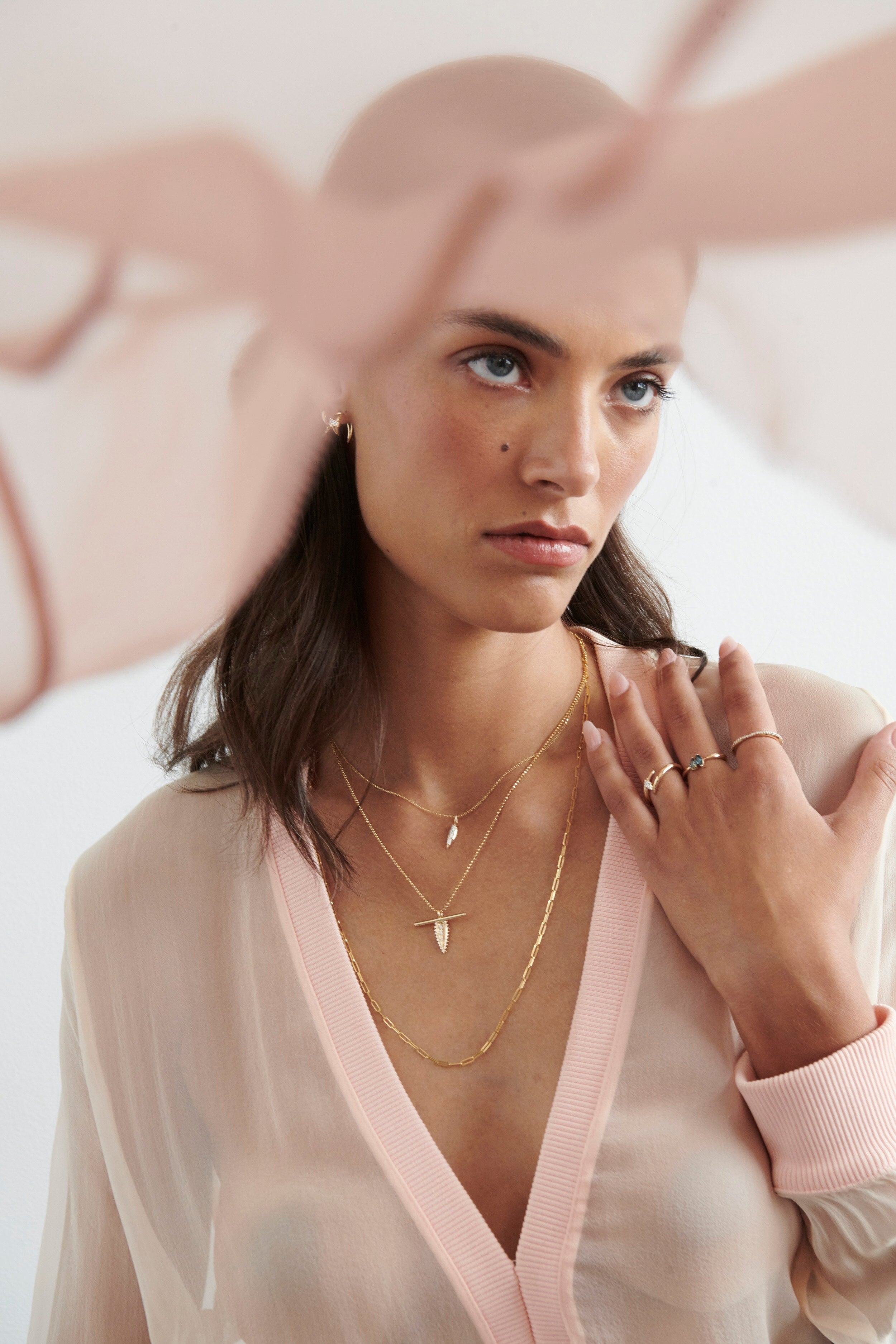 Close-up of Model Wearing Vale Jewelry Swoop Toi et Moi Sapphire Ring