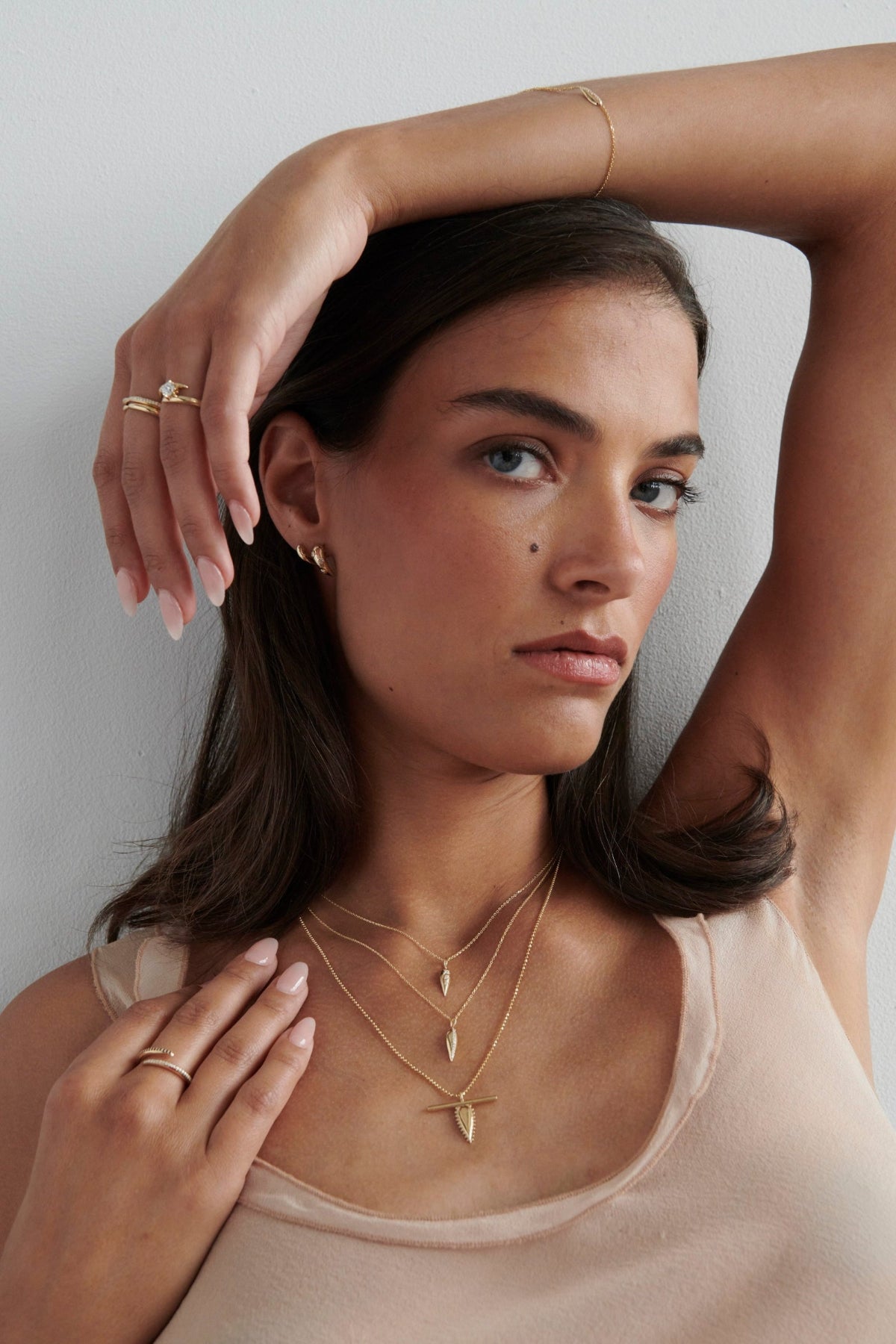 Close-up of Model Wearing Vale Jewelry Swoop Baguette Cut Diamond Necklace