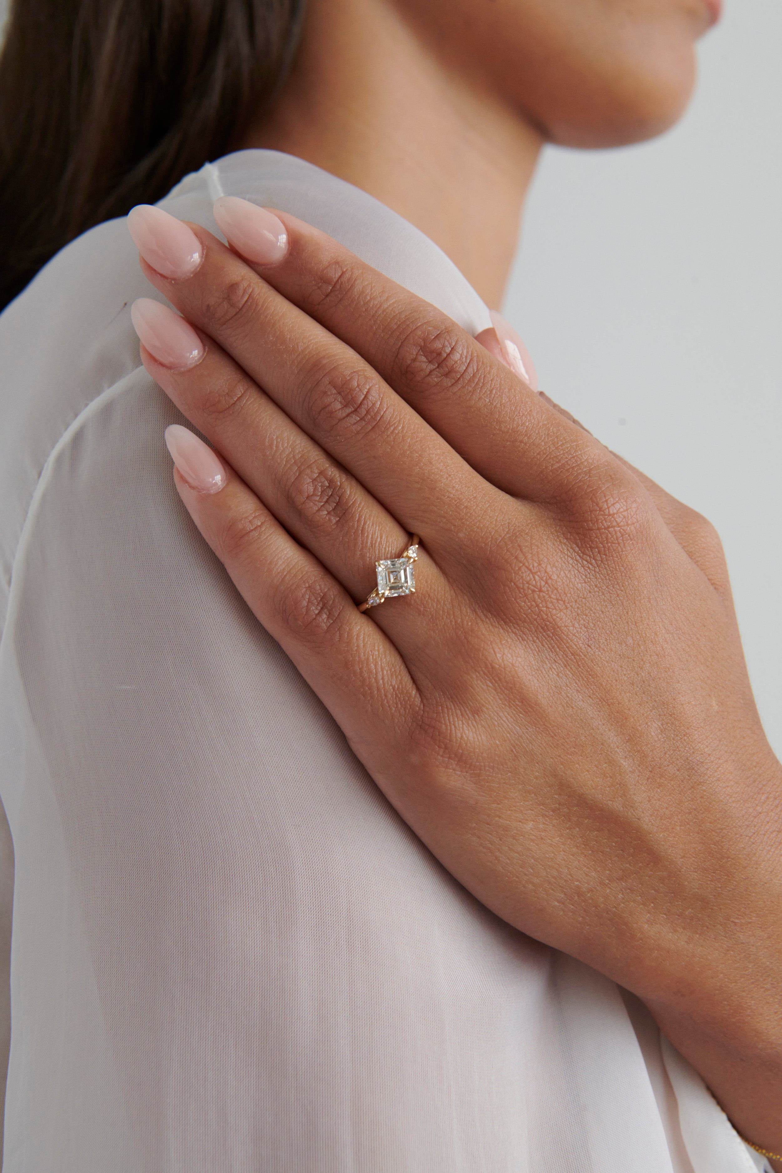 Close-up of Model Wearing Vale Jewelry Alchemy Ring with White Diamond