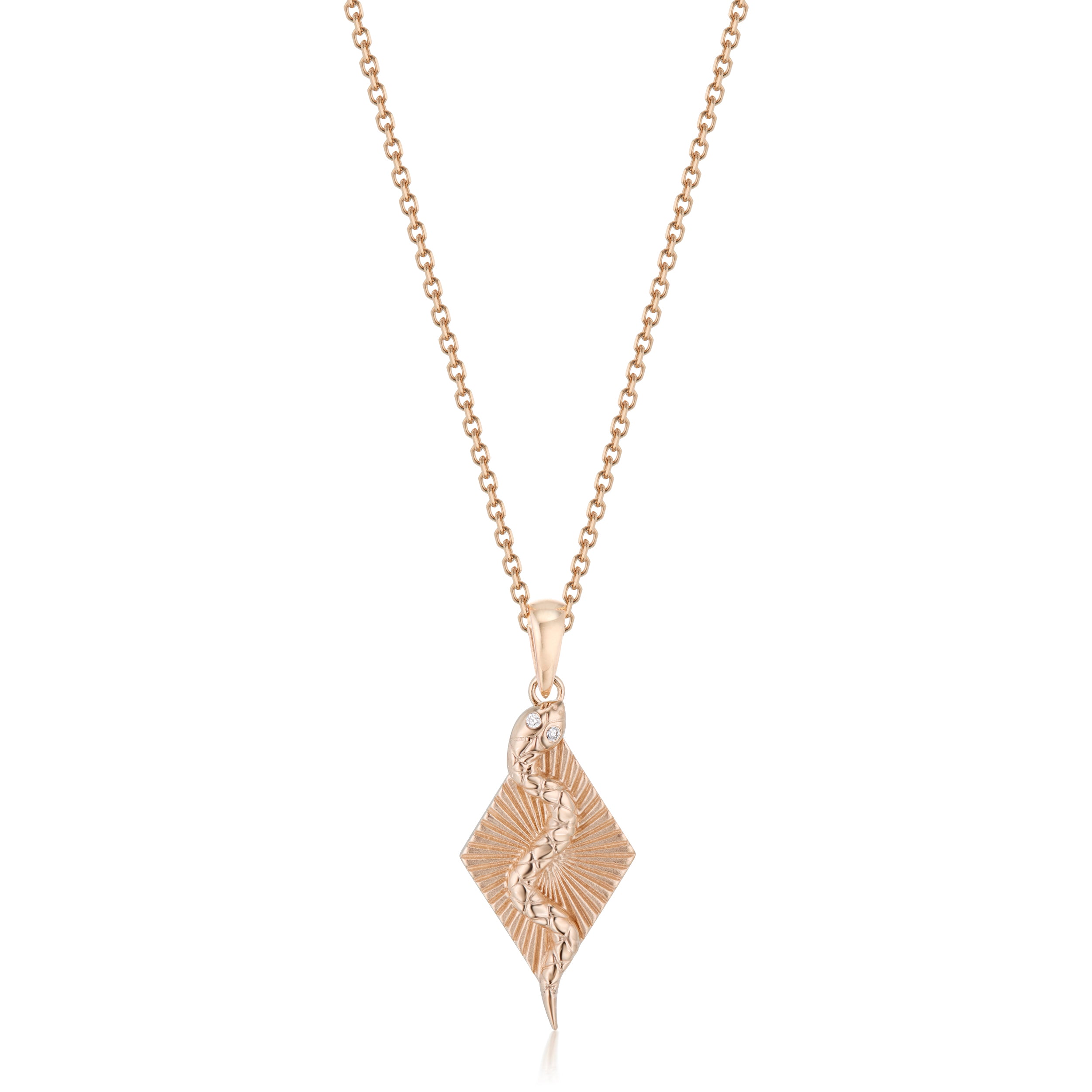 Alt="Vale Jewelry Rose gold textured serpent ray necklace close up with plain white backdrop"