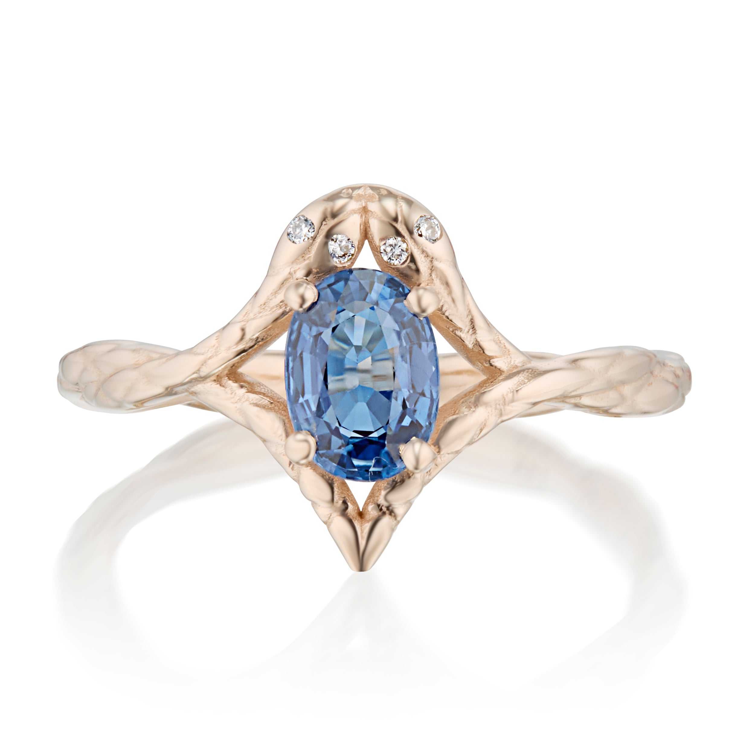 Alt="Vale Jewelry rose Gold symmetrical serpent ring with open set sapphire center"