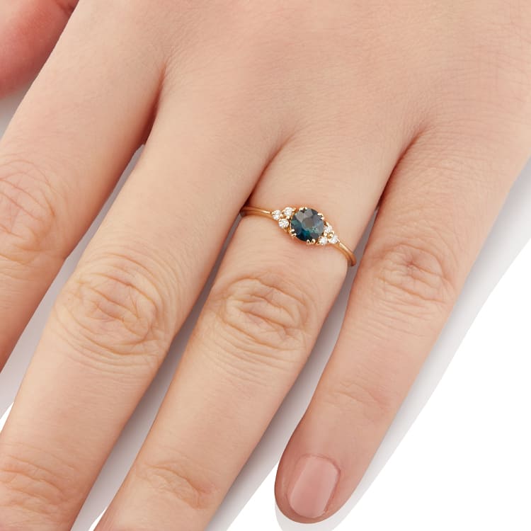 Vale Jewelry Lune Ring with Sapphire in Yellow Gold on Model's Hand