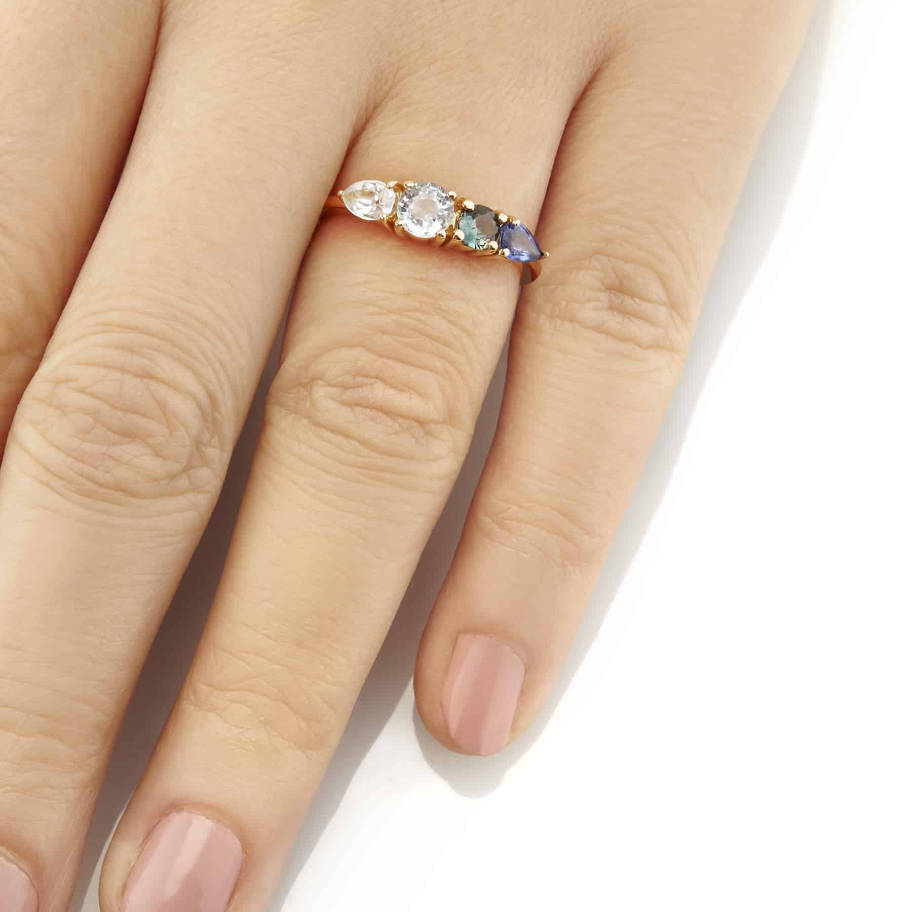 Vale Jewelry Harmony Ring with Multi-Color Round and Pear Shape Blue Sapphires in 14 Karat Yellow Gold Hand View