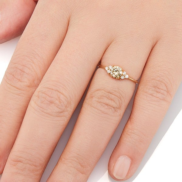 Vale Jewelry Lune Ring with Round Brilliant Cut Champagne Diamond Center and White Diamond Accents in 14 Karat Yellow Gold Hand View