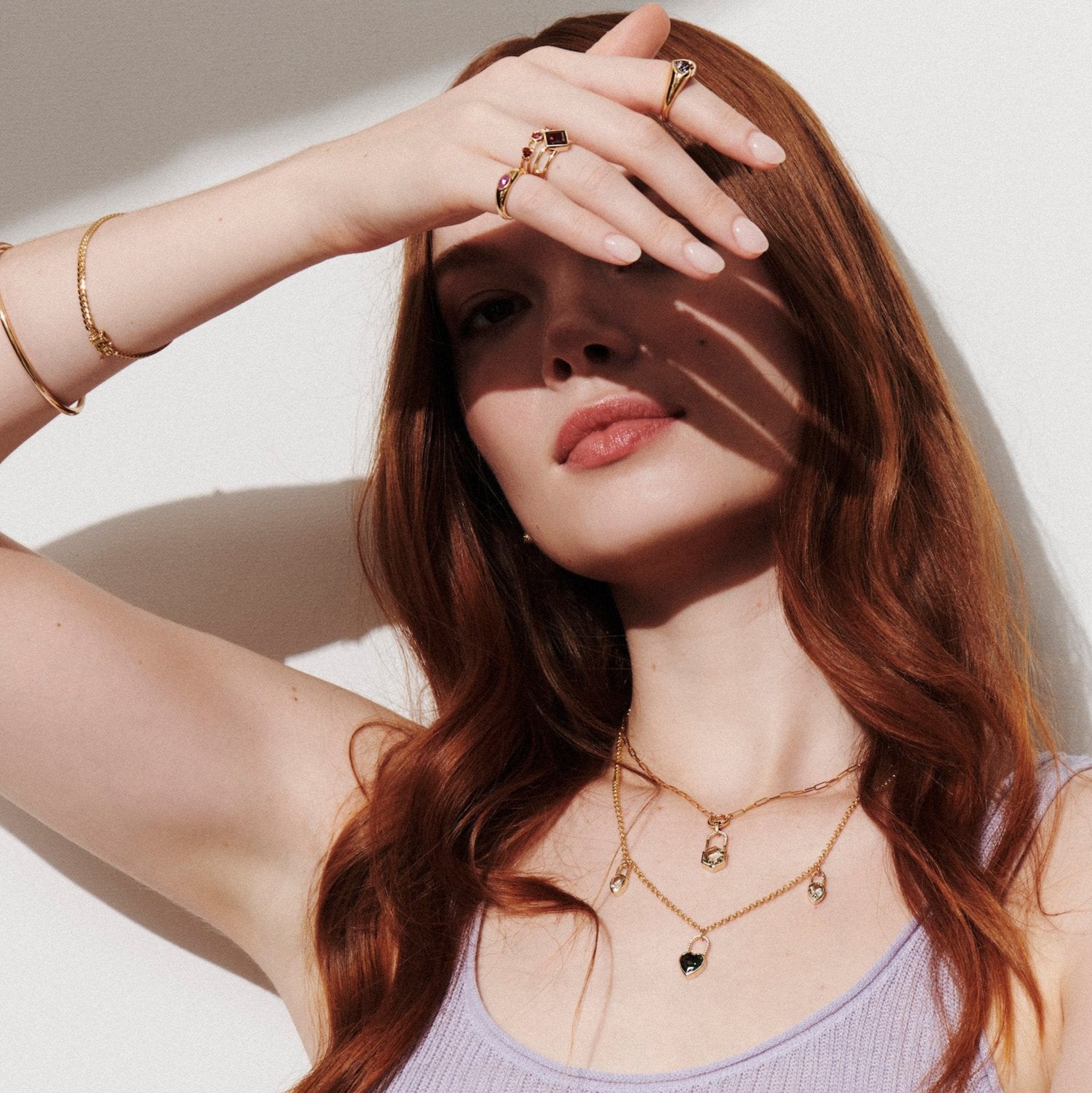 Model wearing the Heart Sapphire & Pear Prasiolite Lock Charm Necklace