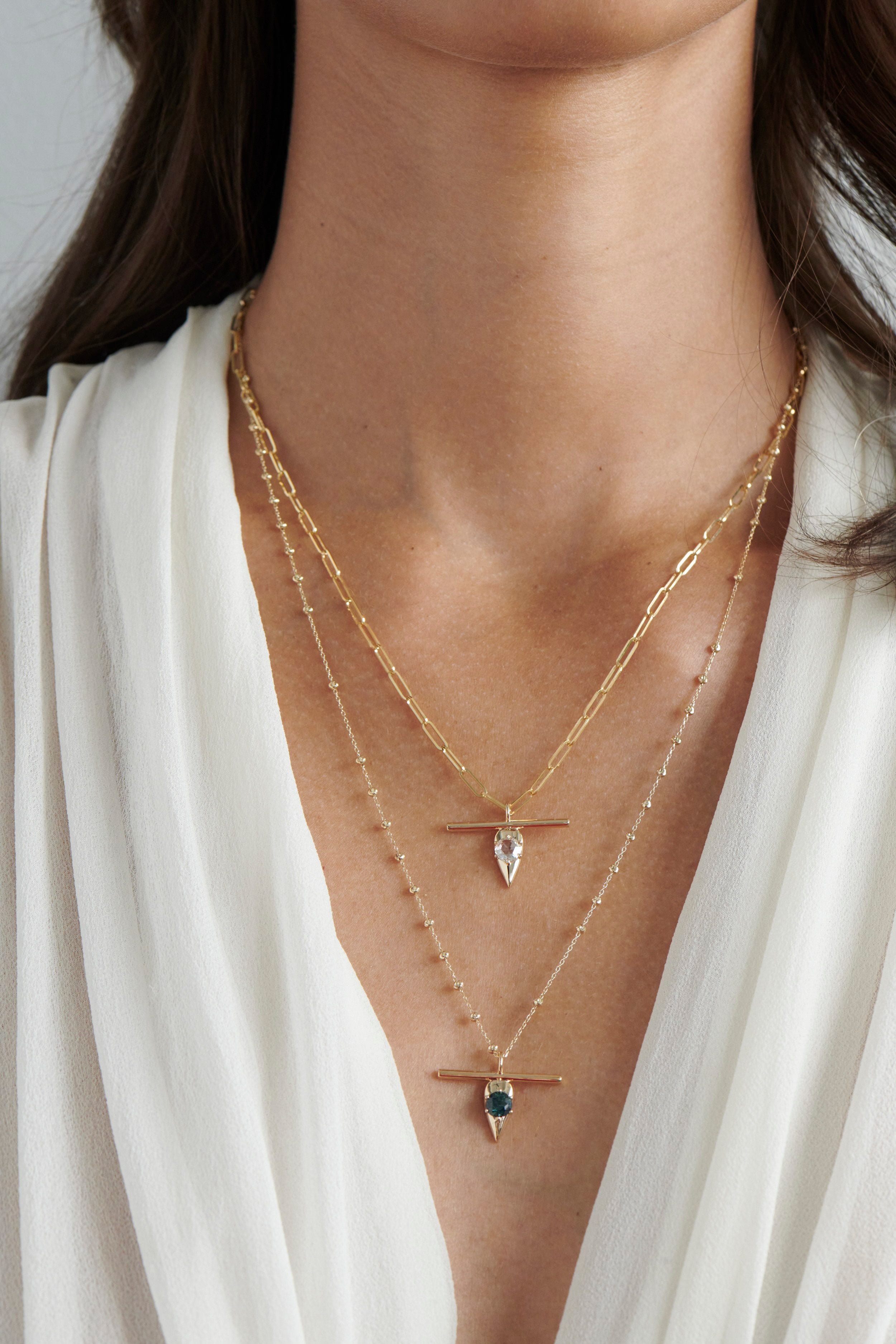 Model Wearing Vale Jewelry Swoop T-Bar Sapphire Necklace