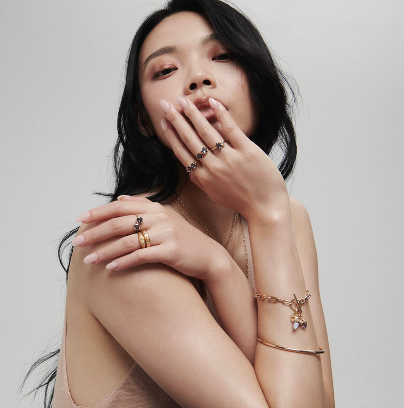 Model Wearing Vale Jewelry Heavy Quotidien Bangle with Spinel and Sapphire Toi et Moi Rings