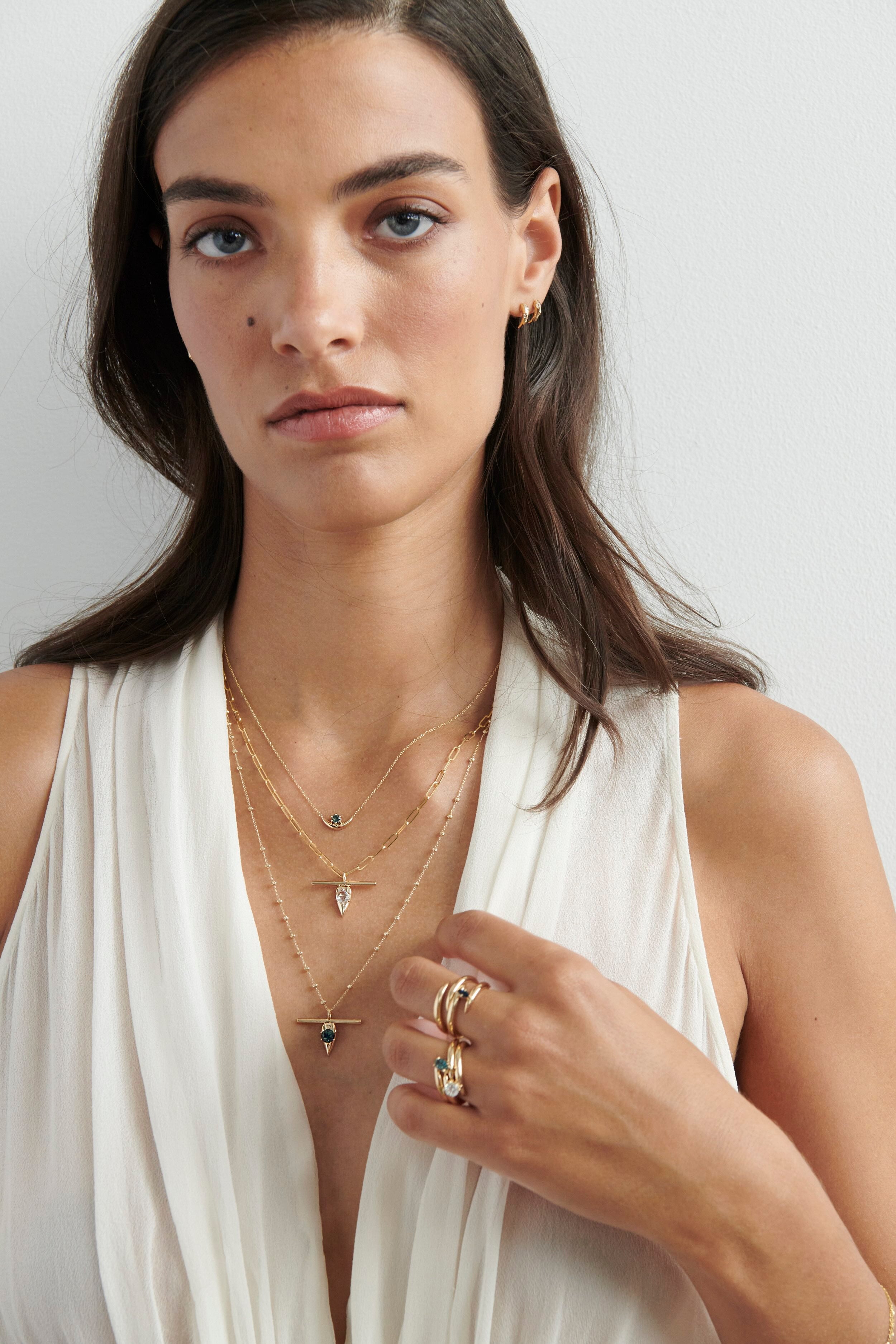 Model Wearing Vale Jewelry Swoop T-Bar Sapphire Necklace