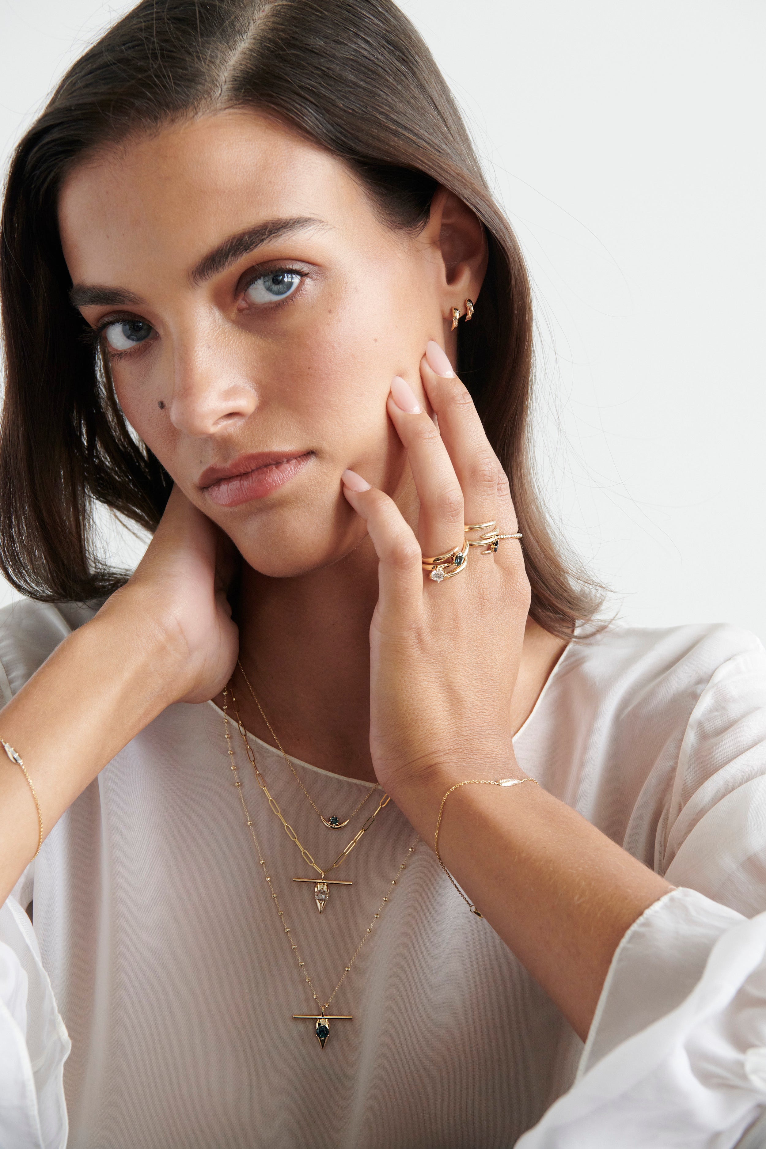Model Wearing Vale Jewelry Swoop T-Bar Sapphire Necklace