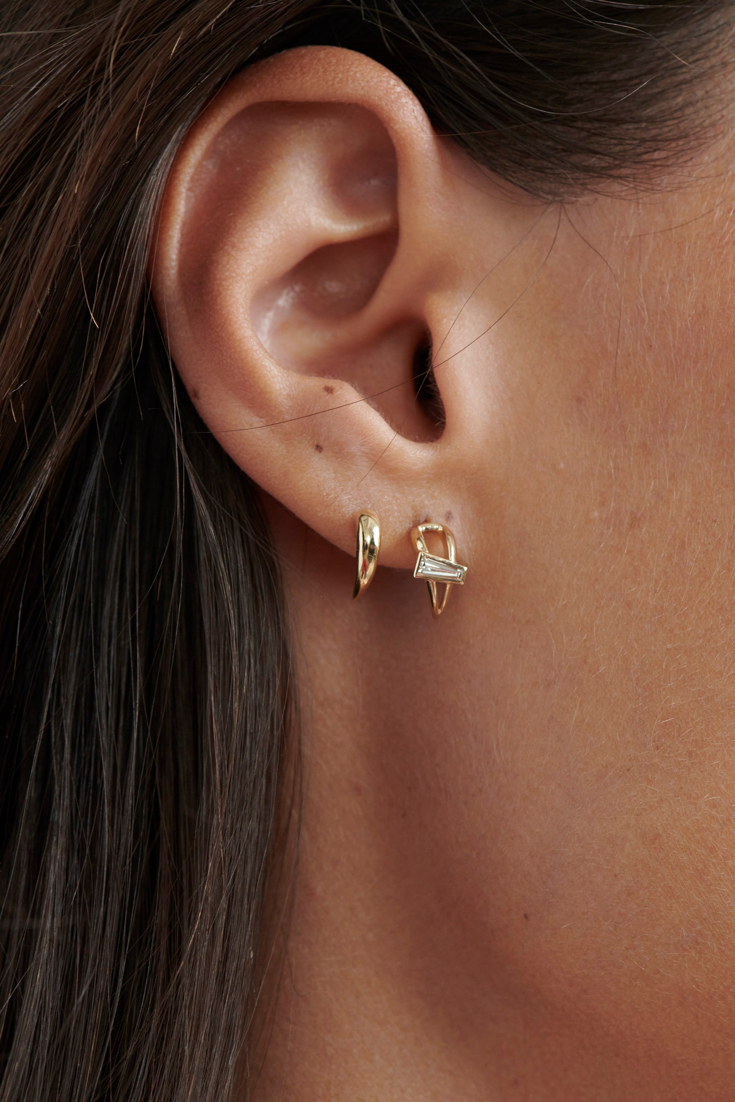 Close-up of Model Wearing Vale Jewelry Open Swoop Tapered Baguette Cut Diamond 2-Piece Earrings