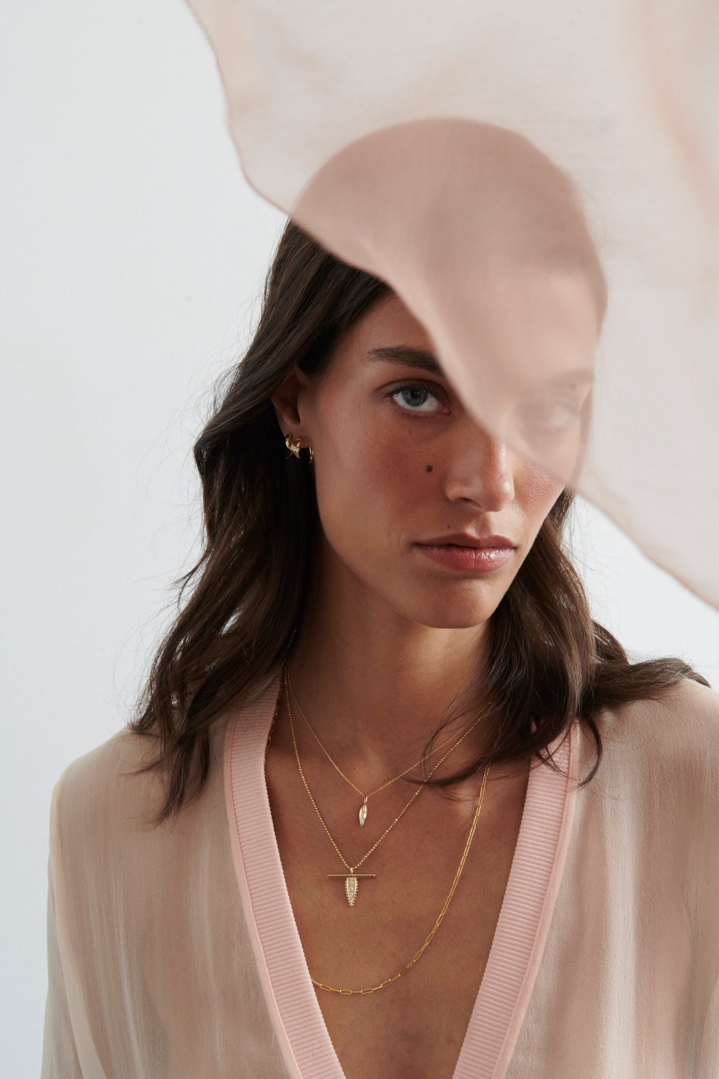 Model Wearing Vale Jewelry Open Swoop Tapered Baguette Cut Diamond 2-Piece Earrings