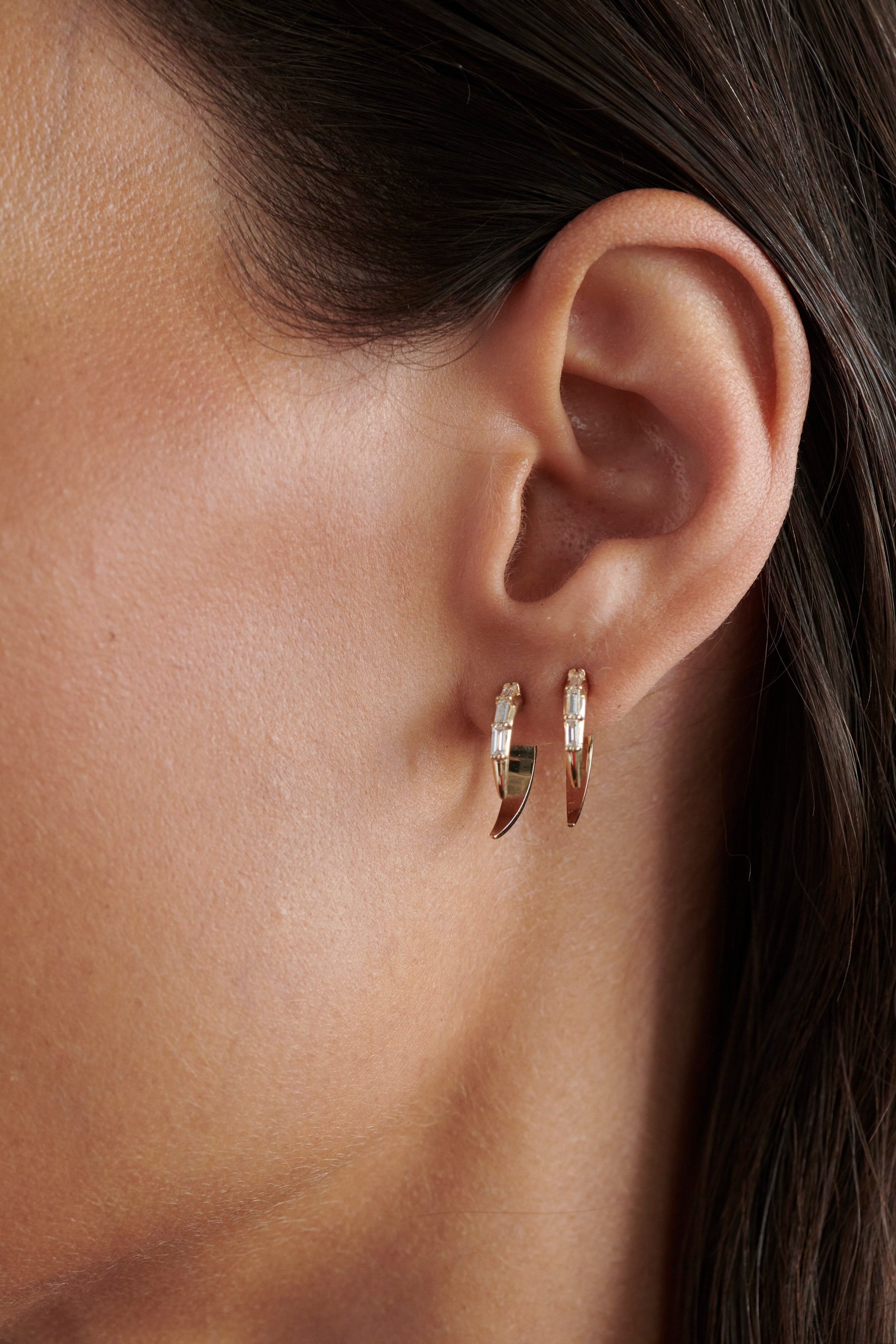 Close-up of Model Wearing Vale Jewelry Swoop Baguette Cut Diamond 2-Piece Earrings