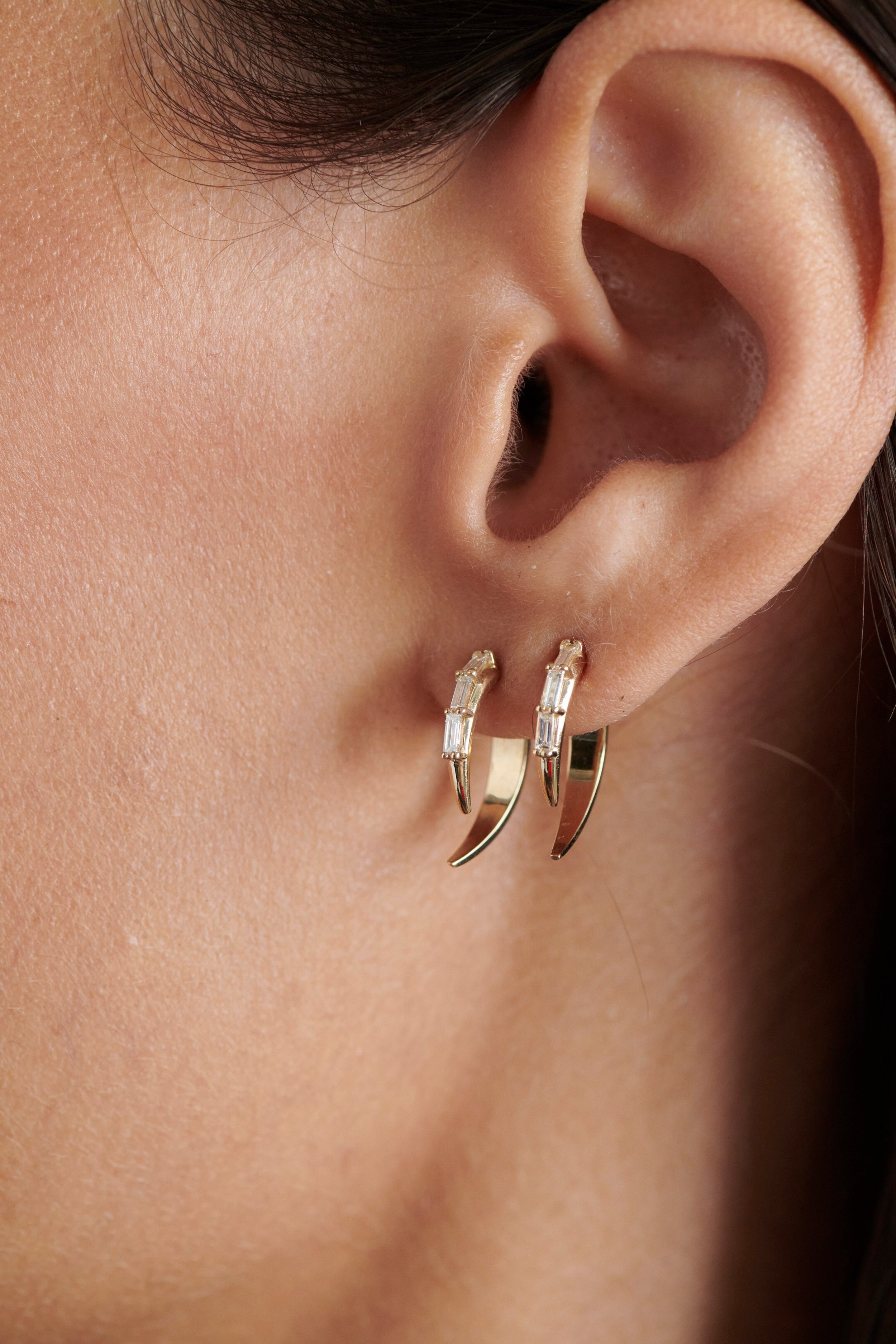 Close-up of Model Wearing Vale Jewelry Swoop Baguette Cut Diamond 2-Piece Earrings