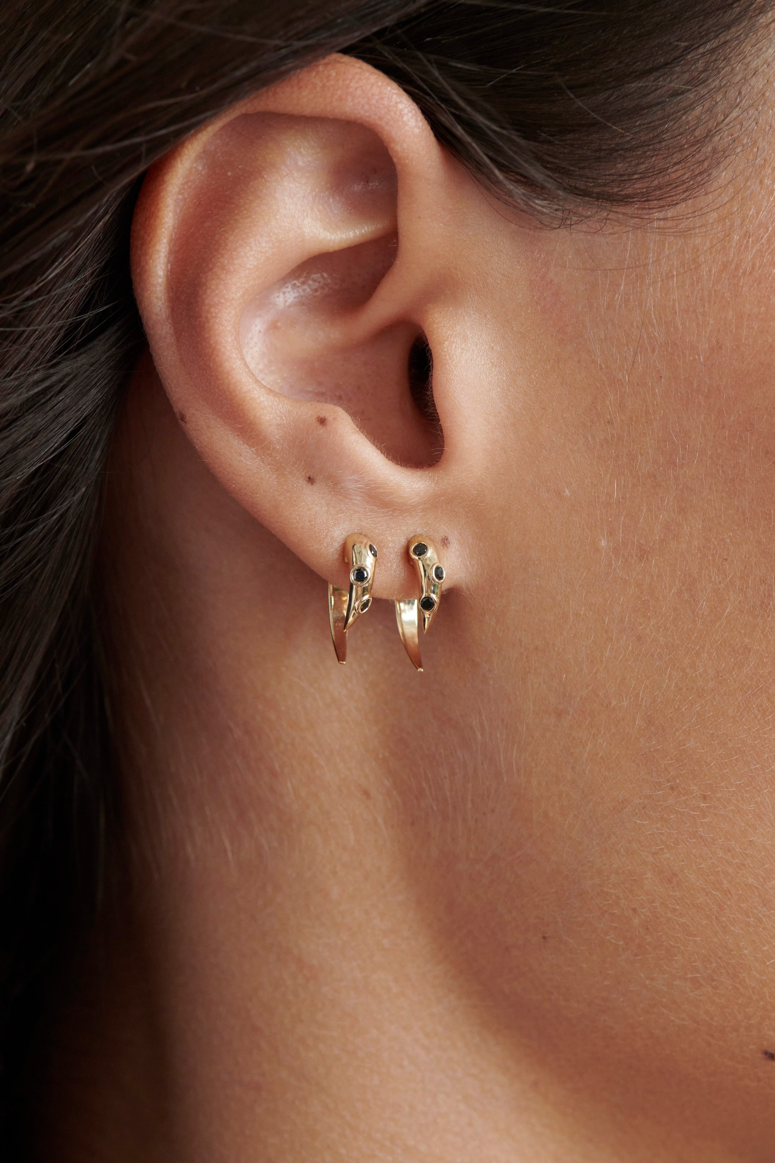 Close-up of Model Wearing Vale Jewelry Swoop Black Diamond 2-Piece Earrings