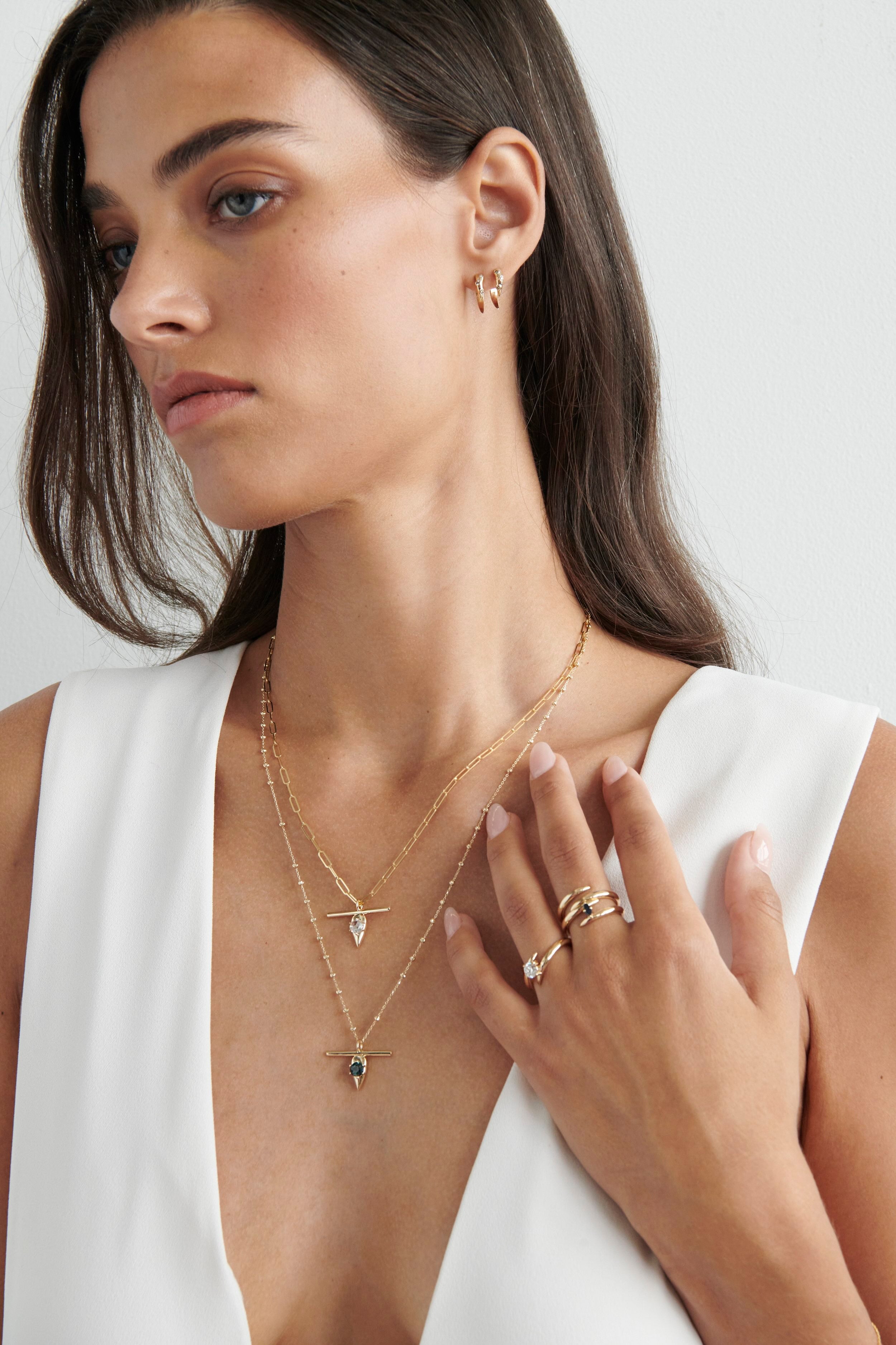Model Wearing Vale Jewelry Swoop Champagne Diamond 2-Piece Earrings