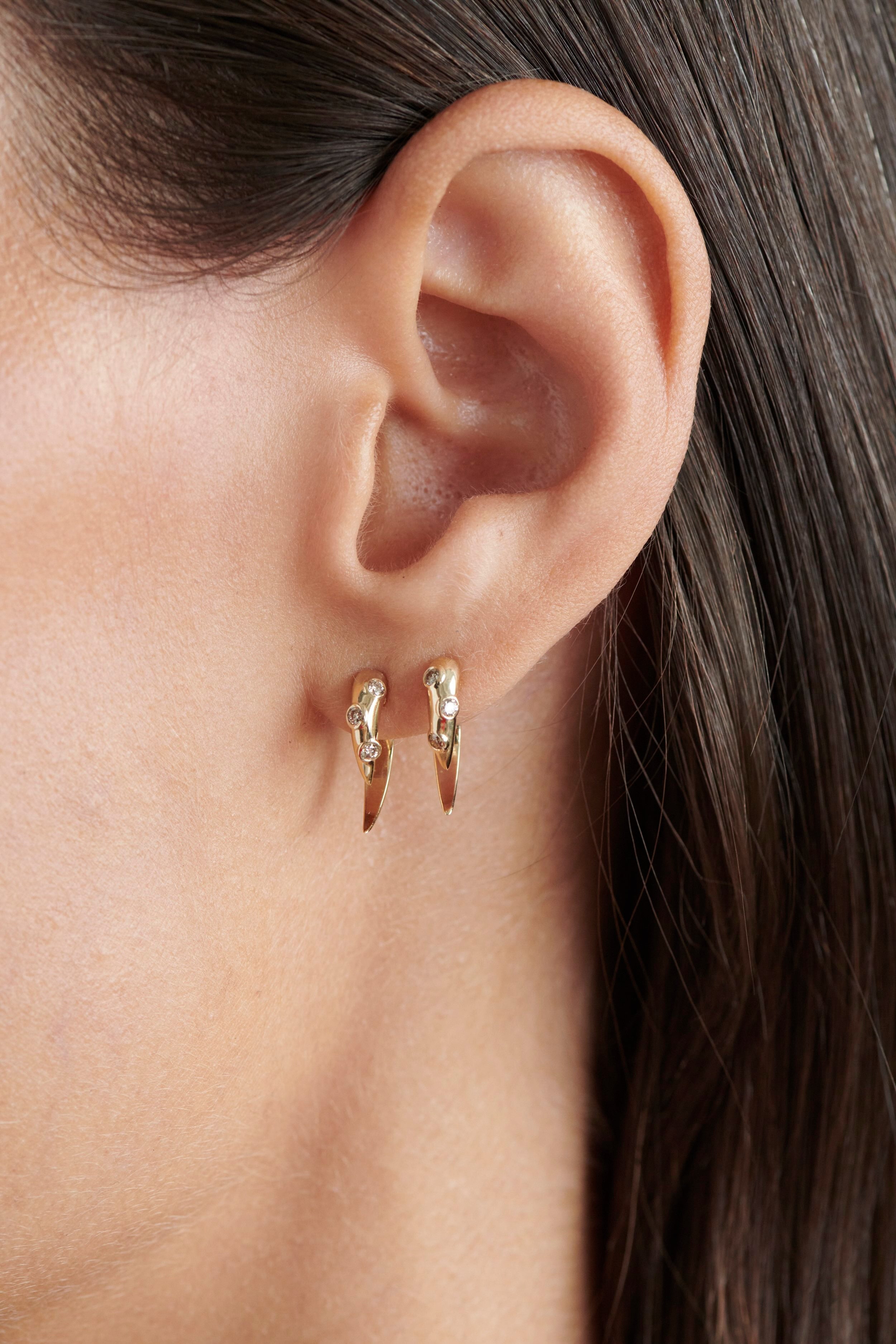 Close-up of Model Wearing Vale Jewelry Swoop Champagne Diamond 2-Piece Earrings