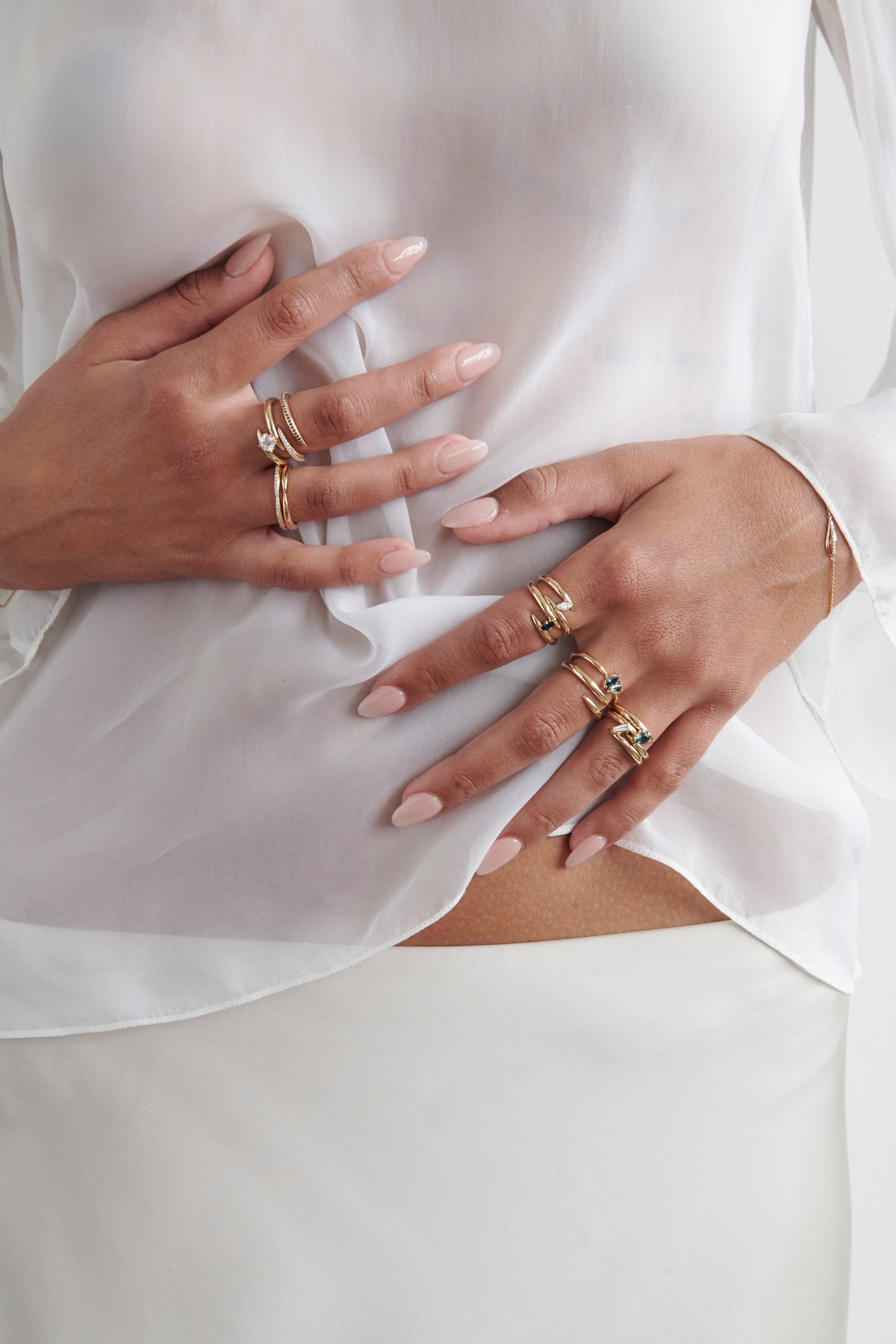 Close-up of Model Wearing Vale Jewelry Swoop Toi et Moi Sapphire Ring