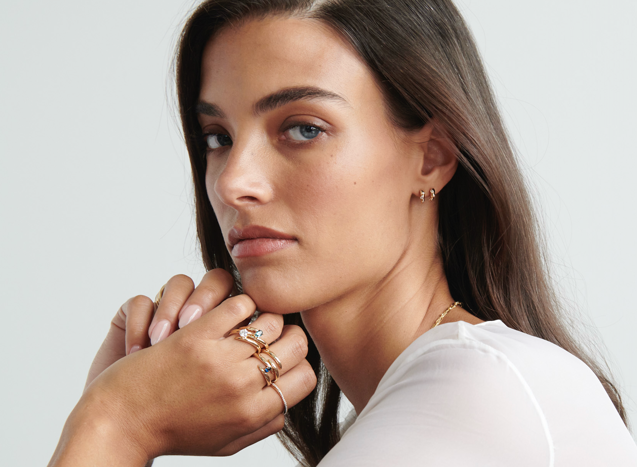 Model Wearing Vale Jewelry Swoop White Diamond 2-Piece Earrings