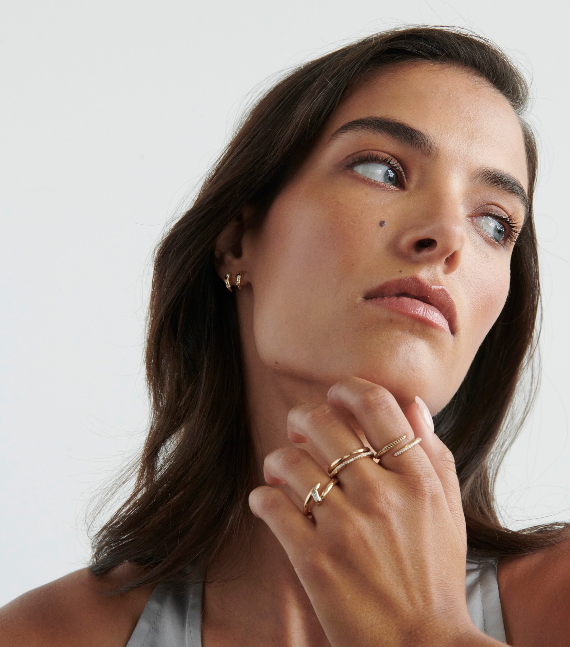 Close-up of Model Wearing Vale Jewelry Swoop White Diamond 2-Piece Earrings