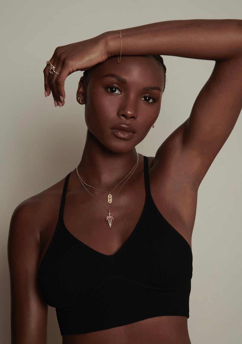 Model Wearing Verriere Necklace with Diamonds and Golden Hour Necklace with Rubies from Vale Jewelry