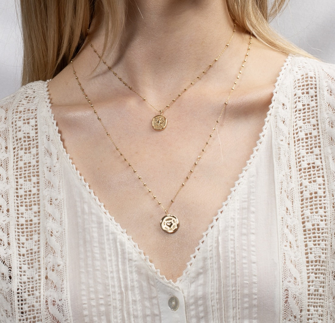 Vale Jewelry Wax Seal Phoenix Amulet Necklace on Model