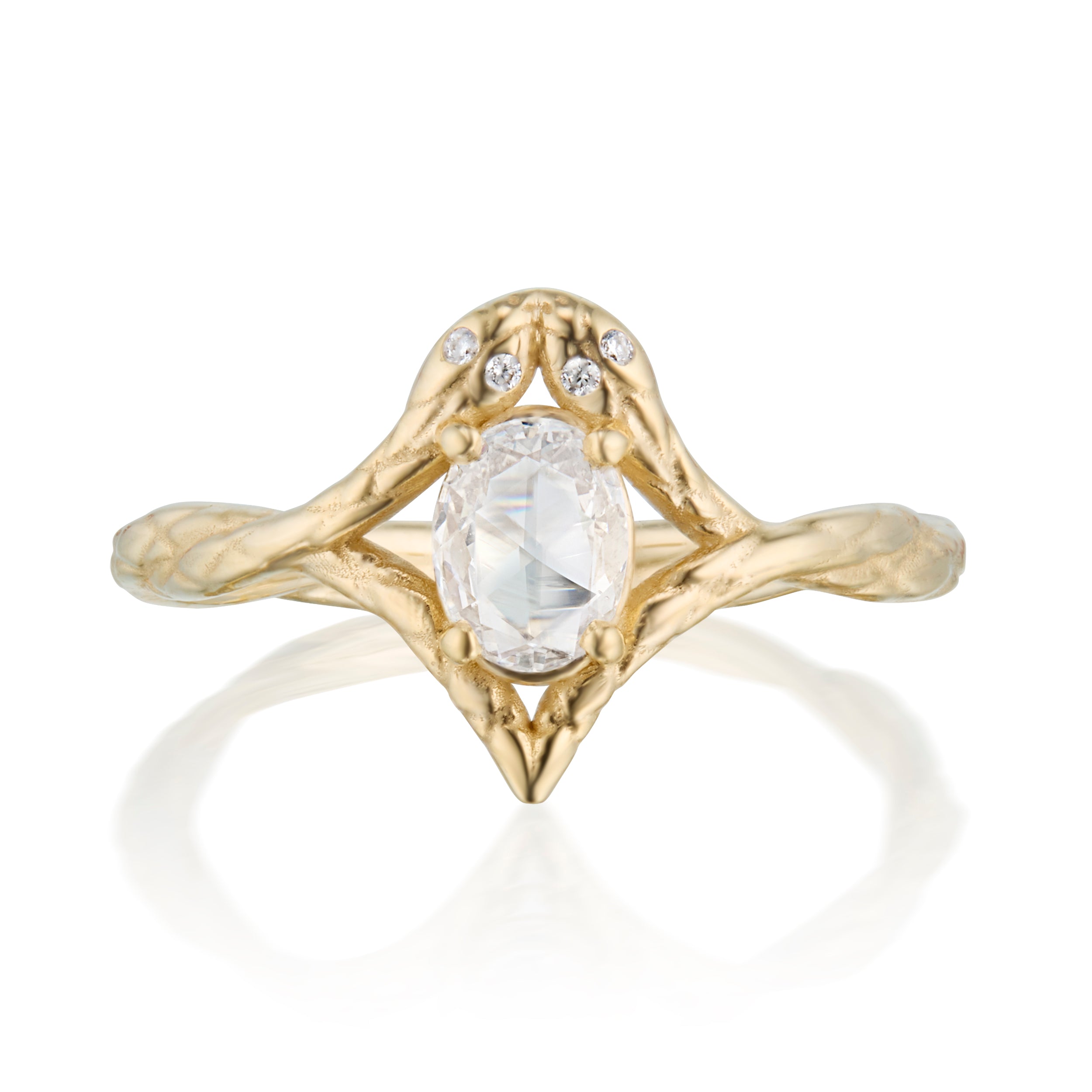 Symmetrical snake motif ring with open set rose cut diamond in center