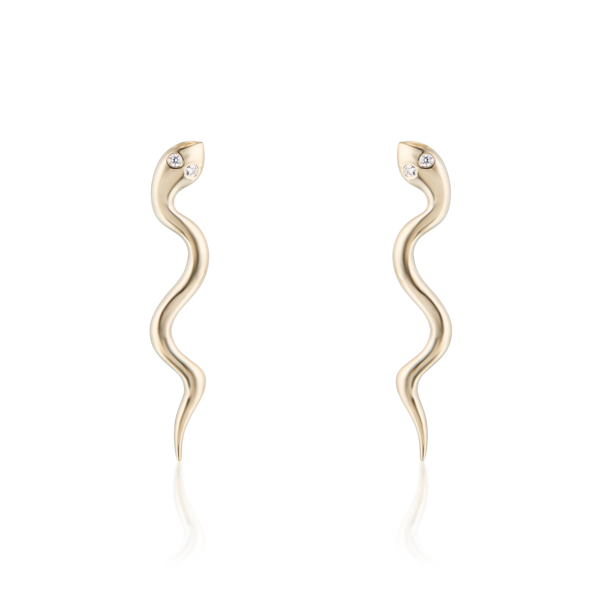 Gold snake-shaped earrings with diamond eyes on a white background