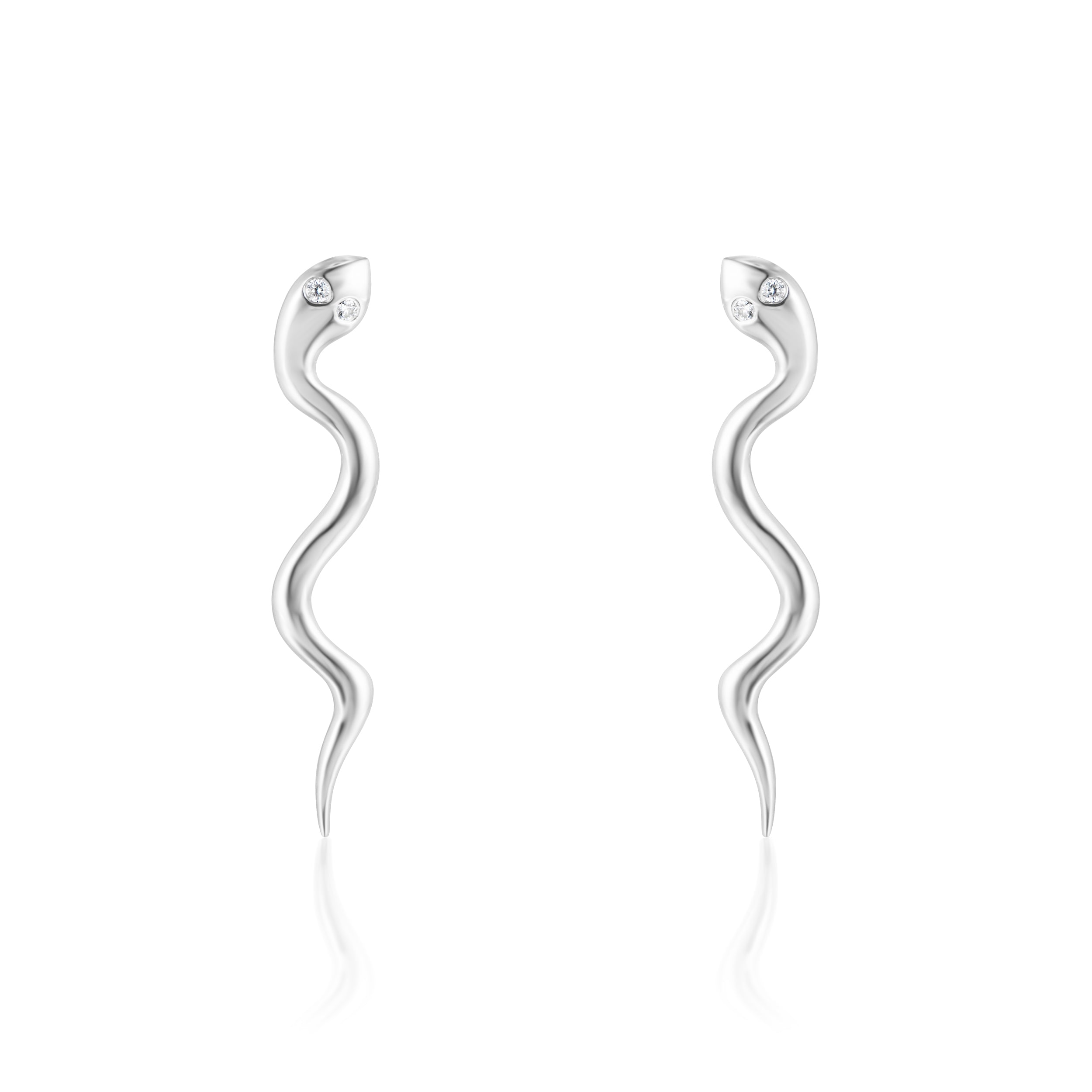 Alt="Vale Jewelry white gold serpent earrings with diamond eyes on a white background"