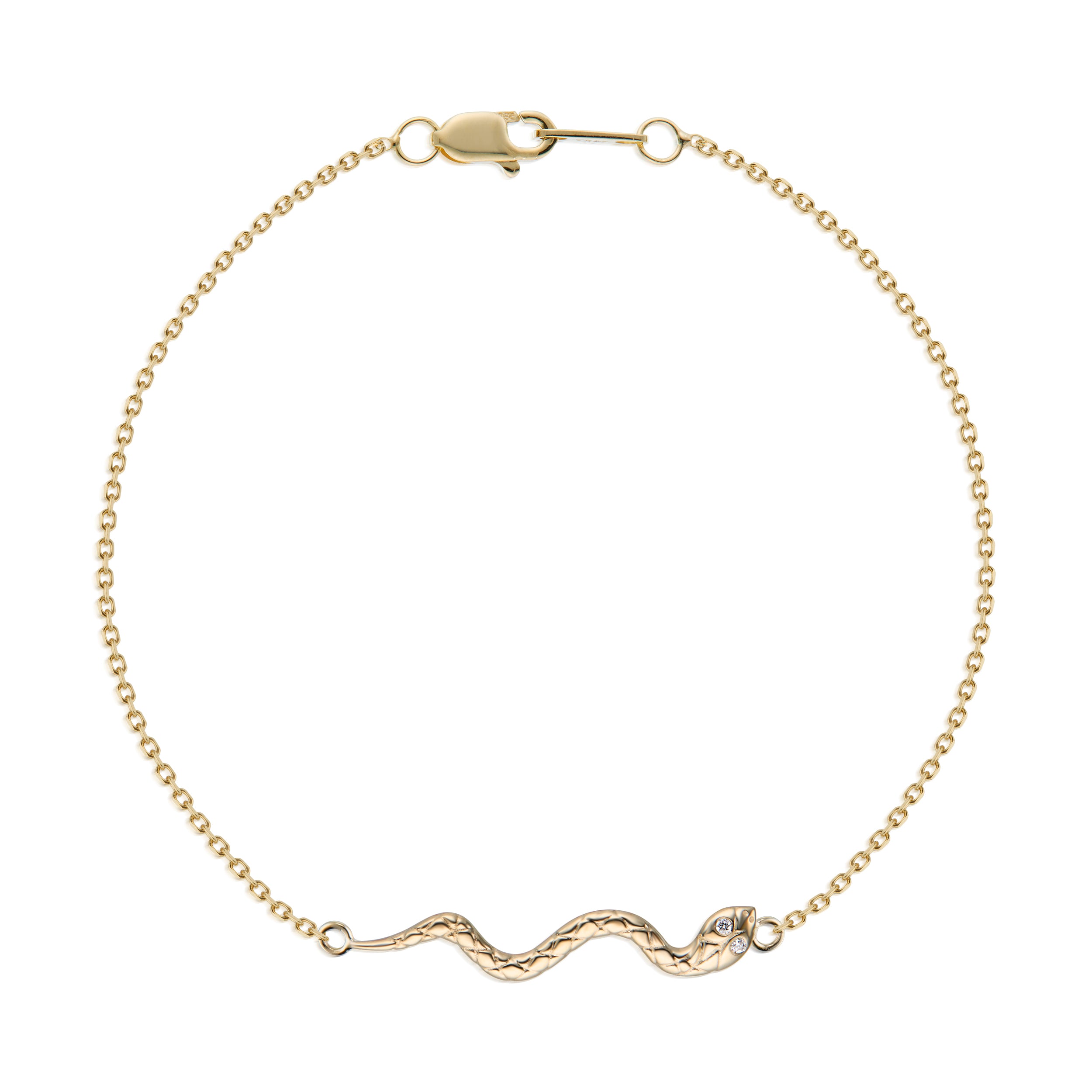 Wide shot of bracelet with gold serpent with diamond eyes