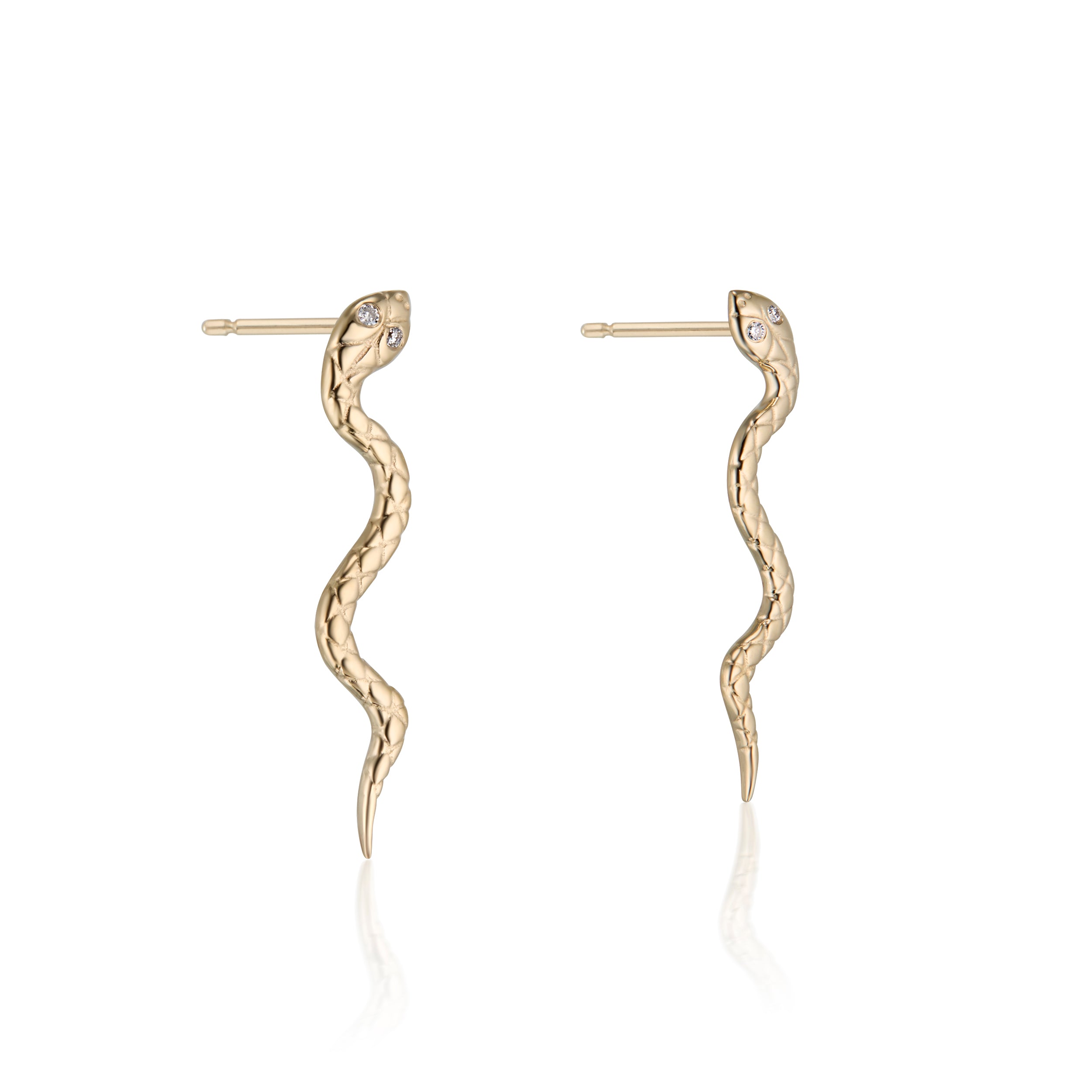 Gold snake-shaped earrings, textured serpent earrings on a white background