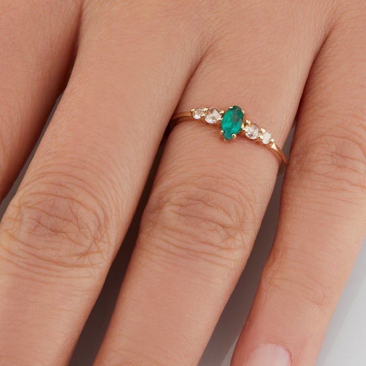 Vale Jewelry Bellatrix Marquise Emerald Ring with White Rose Cut Diamonds in 14 Karat Yellow Gold Hand View