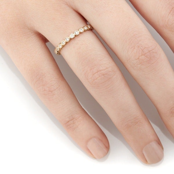 Vale Jewelry Eternity Dew Ring with Bezel Set White Diamonds in 14 Karat Yellow Gold Hand View